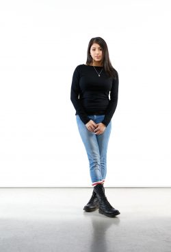 Caitlyn Ngu standing with hands folded