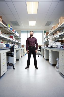 Mohamed Salem standing in a lab