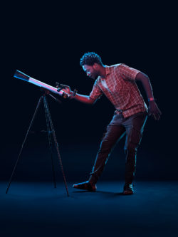 image of man leaning over a telescope