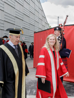 York president and vice chancellor Rhonda Lenton in convocation robes walking to ceremony