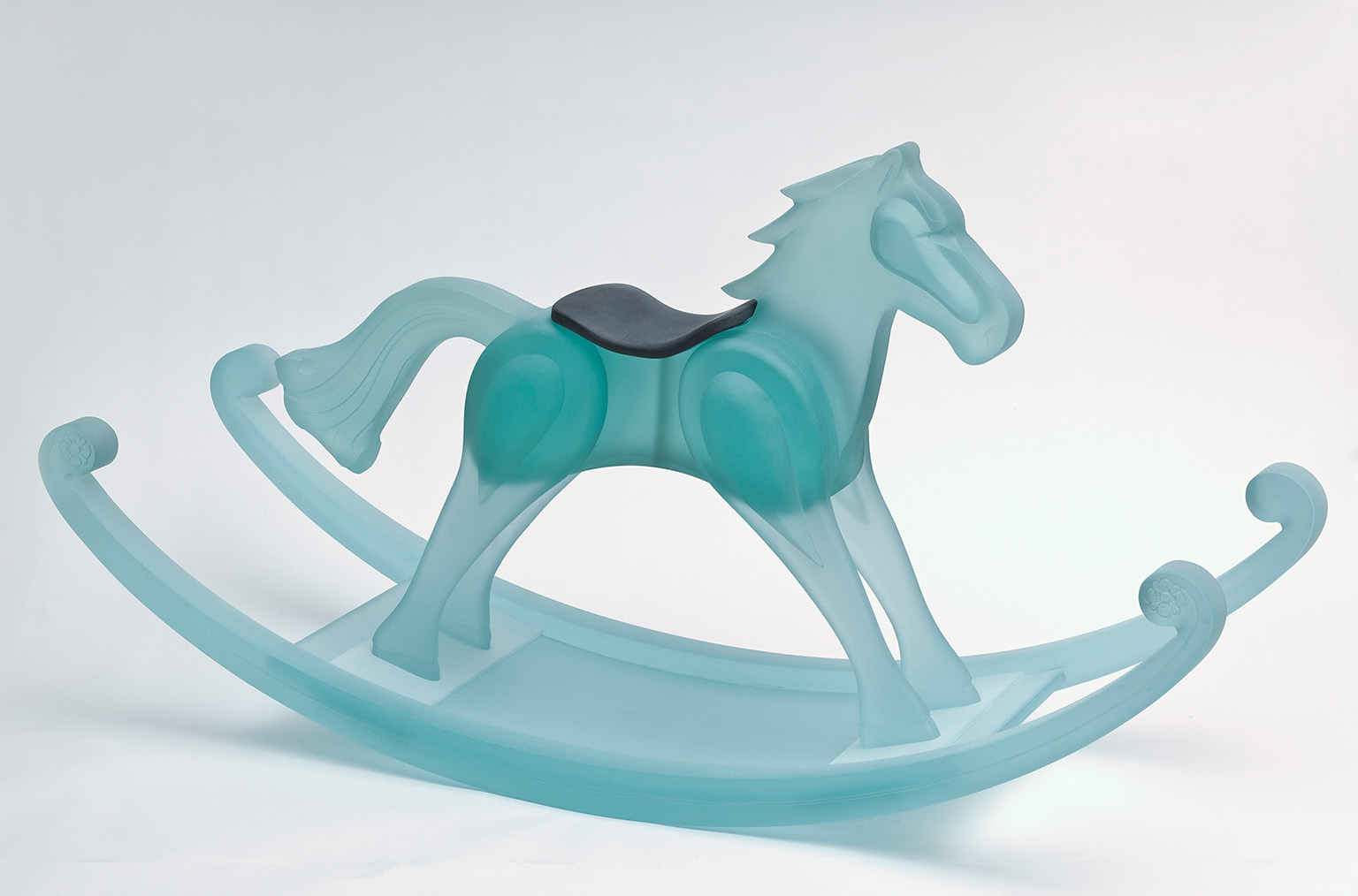 a transparent blue rocking horse